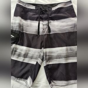 CASTAWAYS Men's Board Shorts. Size XL (36). Drawstring/Velcro Closure.